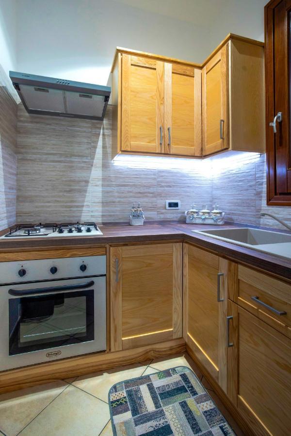 Perla Di Mare Appartamenti กัสเตลลุซโซ ภายนอก รูปภาพ