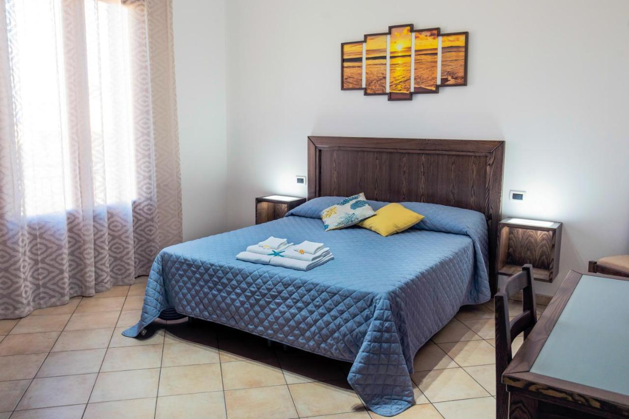 Perla Di Mare Appartamenti กัสเตลลุซโซ ภายนอก รูปภาพ